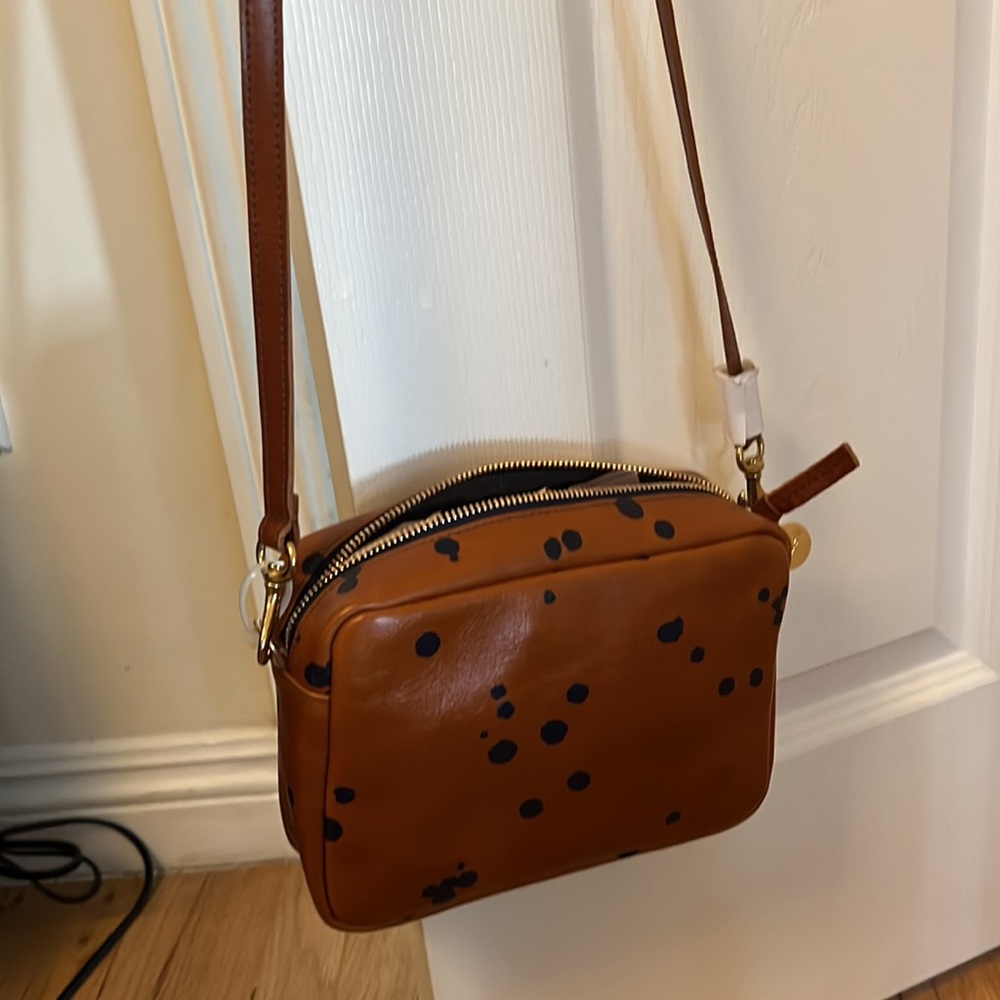 Clare V. Midi Sac.